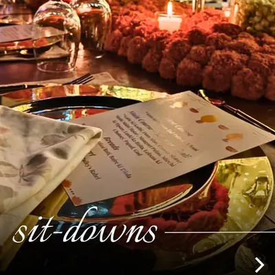 The setting for an unforgettable meal. We pay attention to every detail, from the custom menu cards to the elegant table decor, to create a truly special sit-down dinner experience.