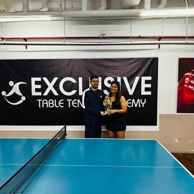 The winner and runner-up of our "Battle Under Light" tournament, both from our academy. This event shows our commitment to providing competitive opportunities for our adult players.
