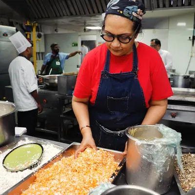 There is nothing better than using bare hands to create. Here I am in the kitchen, mixing ingredients for a thoran. I believe the best food is made with a personal touch, just like it's eaten.