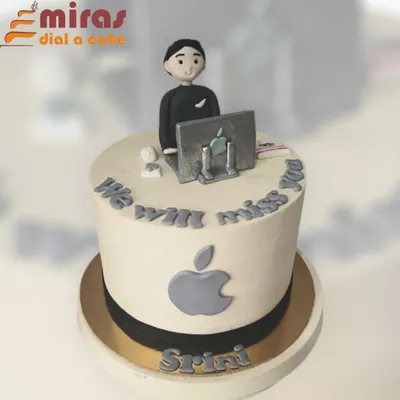 This farewell cake was for a valued team member at Apple. It features a figurine of the employee at their desk, the iconic Apple logo, and a heartfelt "We will miss you" message.