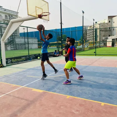 A player executes a perfect layup during a morning practice game. We drill these fundamental scoring techniques until they become second nature.