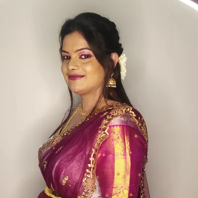 Kalyani looking lovely for her cousin's wedding. I created a soft glam look with pink eyeshadow and a matching lip, paired with a simple hairstyle.