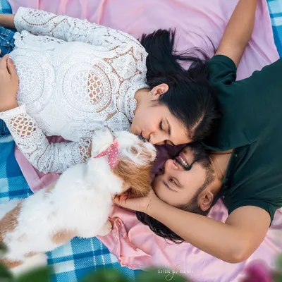 A unique perspective on love. This overhead shot of a couple and their little dog sharing a sweet moment on a picnic blanket is one of my all-time favorites. It's intimate, creative, and full of warmth.