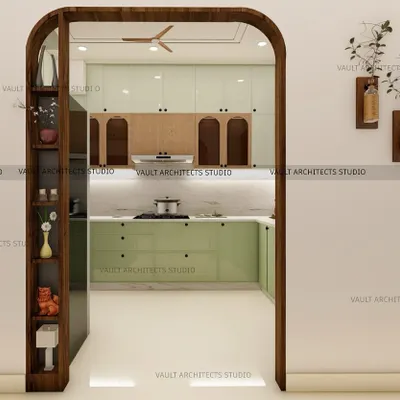This 3D render shows the view into the kitchen through a custom-designed arched doorway with built-in shelving. This feature acts as a beautiful transition between spaces while providing extra display storage.