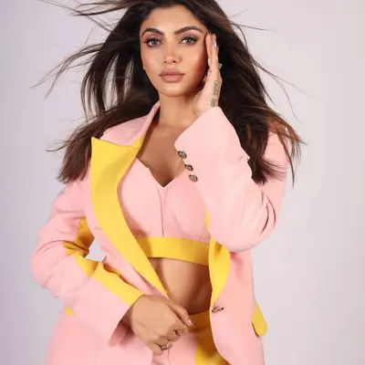 A vibrant studio portrait with a wind machine to add movement and energy. This is a great technique for fashion lookbooks to make the images feel more dynamic.