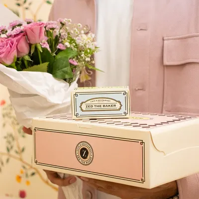 The perfect gift is a combination of beauty and taste. Here, a box of my fresh pastries is paired with a beautiful bouquet of flowers, creating a thoughtful and elegant surprise for a loved one.