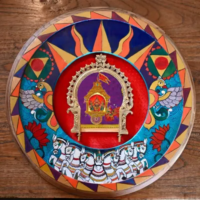 The Surya (Sun) frame, resplendent in red and gold. The artwork depicts the Sun God on his seven-horse chariot, framed by his yantra and lotus motifs, all hand-painted on a restored clock frame.
