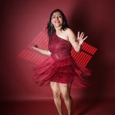 The joy of movement in this red fringe dress. This look is perfect for a high-energy cocktail party or a sangeet night where I need to bring the party to life.