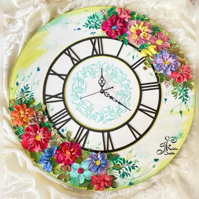 This large 20-inch wall clock shows how art can be functional. I designed it with a clean, classic face to let the cascade of colorful, hand-sculpted flowers be the star, turning a simple clock into a beautiful piece of home decor.