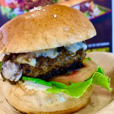 A closer look at my caramelised oyster mushroom burger. I use a special home-style herb mix and spices like coriander and jeera to give the patty a rich, satisfying flavour that rivals any meat burger.