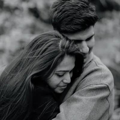 A close, tender hug in the cool air of Ladakh. This black and white portrait focuses on the warmth and comfort the couple finds in each other, even in a rugged, remote landscape.