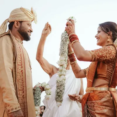The playful and joyous garland exchange is a key moment in many Indian weddings. We capture the smiles and laughter of this beautiful ritual, preserving the memory forever.