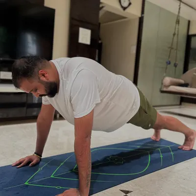 Personal fitness training is a game-changer. This client is perfecting his plank form at home, building core strength that is fundamental to all other movements.