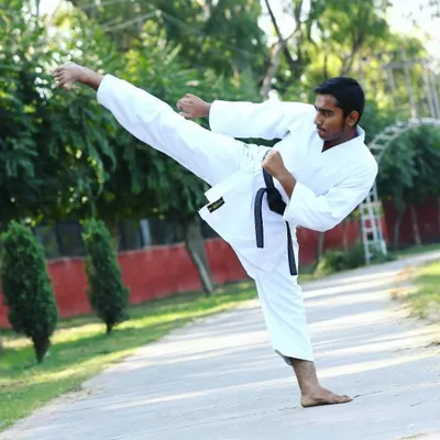 A powerful side kick requires perfect form, from the pivot of the foot to the extension of the leg. This is a fundamental technique we practice to build power, balance, and control.