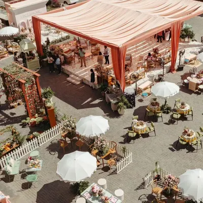 An aerial view of the Parisian Market-themed Mehendi I designed. The layout included various stalls and seating areas to encourage guests to explore and interact.