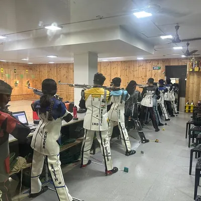 A wide view of our 10m shooting range, where athletes are engaged in a focused training session. Each lane is equipped with advanced electronic targets to track performance with precision.