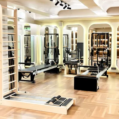 This is your haven for movement and mindfulness. Our spacious and brightly lit studio features a full range of Pilates equipment, from reformers to the Cadillac, in a pristine setting.