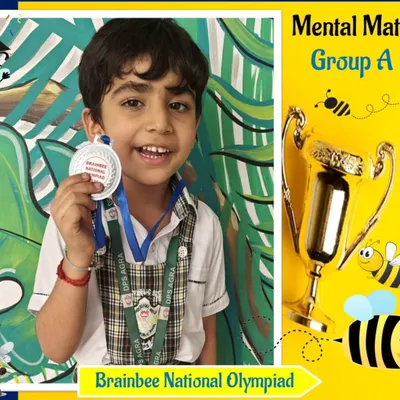 The smile of a champion. This young winner from our Mental Math Group A proudly shows off his medal from the Brainbee National Olympiad, a symbol of his hard work and achievement.