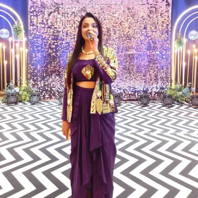 On stage for a Sangeet ceremony, ready to get the party started. For this event, I not only hosted but also helped curate the sound, DJ, and a special photo booth to make the night extra memorable for the couple.