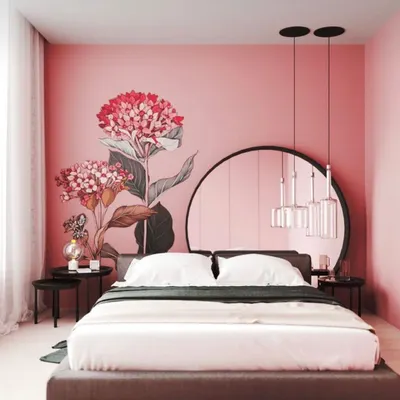 A dramatic bedroom featuring a large-scale floral mural on a pink accent wall. This type of custom wall art turns the bed wall into a stunning centerpiece of the room.