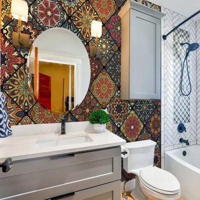 Our Traditional Blooming Pattern wallpaper adds a burst of color and intricate design to this bathroom. It’s a great way to introduce a classic Indian aesthetic into even the smallest of spaces.