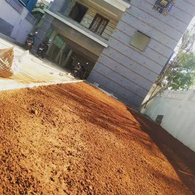 Before: The first step in creating a beautiful lawn is proper ground preparation. Here we have leveled and prepared the red soil for a villa project in Yelahanka.