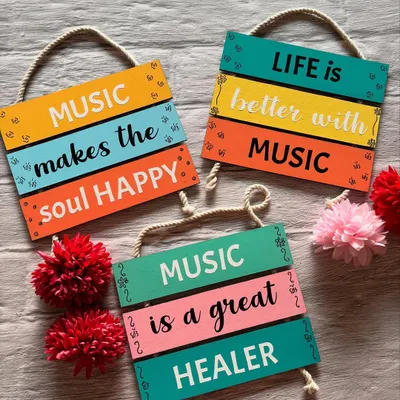 For the music lovers! A set of three colorful wall hangings with quotes like "Music makes the soul happy" and "Life is better with music."