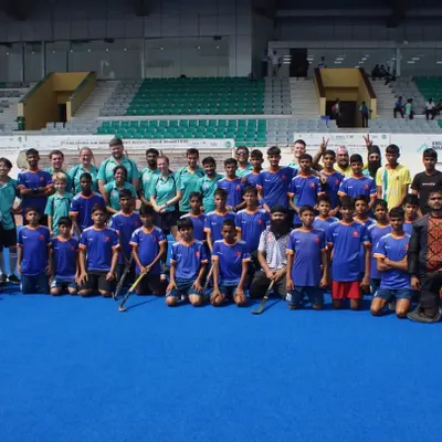 My players and a visiting team from Salute Hockey Academy pose together at a brilliant venue in Delhi. These friendly matches are great for building experience and sportsmanship.