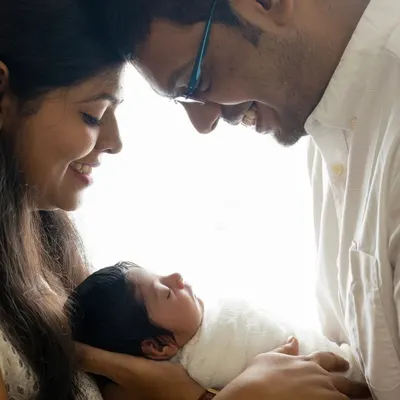 A collection of intimate moments with new parents adoring their newborn baby. I use high-key lighting to create a soft, bright, and emotional feel.