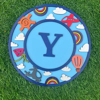 For the little adventurer with their head in the clouds! This travel themed monogram kit features the letter 'Y' surrounded by airplanes, kites, and hot air balloons. It’s a perfect way to personalize a child's room decor.