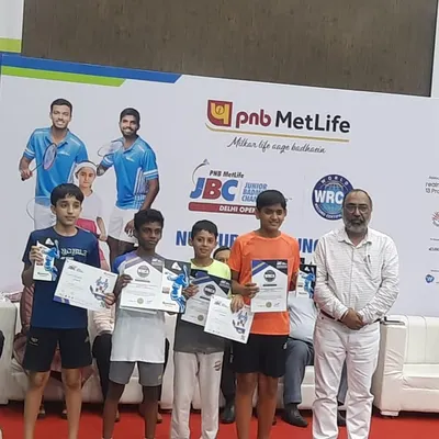 Our young champions holding their certificates and trophies at the PNB MetLife Junior Badminton Championship. Their amazing performance led to one gold and three bronze medals for the academy.