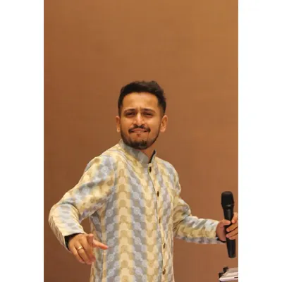 A candid, unposed smile during a performance. These are the moments of pure joy I find on stage, connecting with the music and the audience in a real and authentic way.