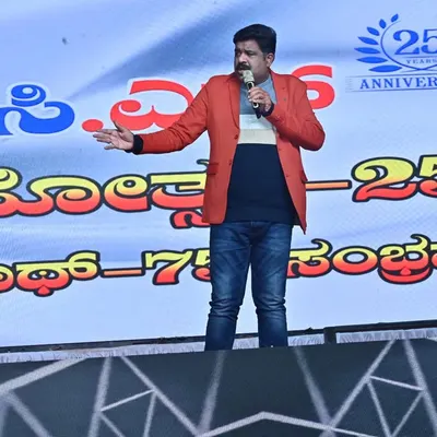 Performing on stage during the 25th-anniversary celebrations of RCN Channel in Hunsur. It was a big event, and I was happy to entertain the large crowd that had gathered.