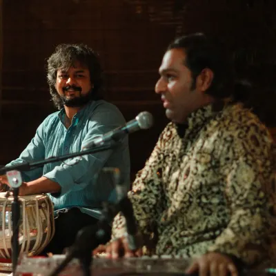 A candid shot from a ghazal concert at The Courtyard Baithak Series with Shri Sanam Khan.