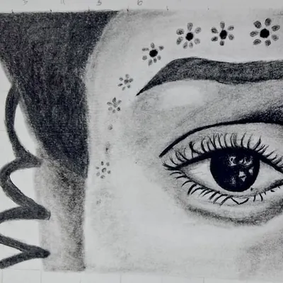 A detailed close-up of a student's pencil portrait exercise. This work showcases techniques for shading skin, rendering realistic eye reflections, and drawing intricate details with graphite.