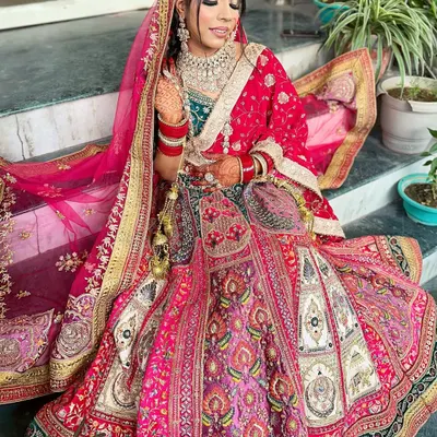 A stunning bridal makeup look created during a demo session. This image showcases the intricate detail and professional quality our students learn to achieve for a bride's special day.
