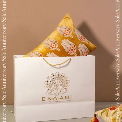 My mega sale is here. This image, showing a cushion in a signature gift bag, is your invitation to shop exclusive designs at unbeatable prices and give your space the elegance it deserves.
