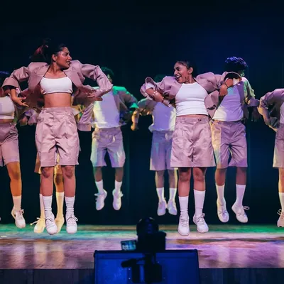 A moment of pure flight from our Performance Night. This shot captures the energy and synchronization our dancers achieve, turning months of hard work into a breathtaking stage performance.