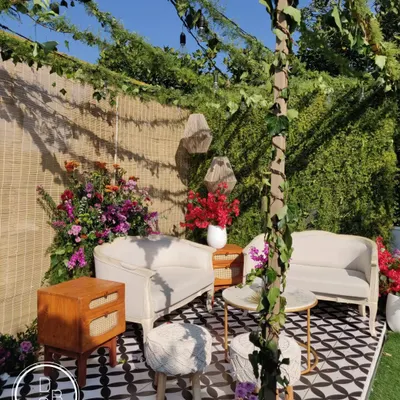 This cozy lounge corner, set up for an intimate terrace wedding, stole my heart. The mix of patterned tiles, natural textures, and colorful flowers created a perfect spot for sunset pheras.