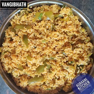 This is Vangibhath, a classic brinjal rice dish from Karnataka. I make it with a special Vangibhath powder that I prepare at home, ensuring an authentic and aromatic flavor in every bite.