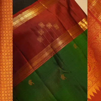 A classic Kanjivaram in maroon and green, featuring a traditional Korvai border where the two colors are interlocked by hand on the loom.