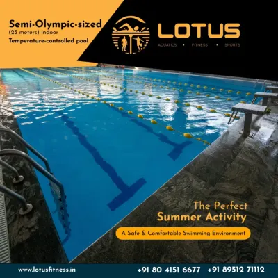 A clear view of our pristine, 25-meter semi-Olympic indoor pool. The lane dividers and starting blocks show its suitability for both fitness swimming and competitive training, all in a clean, climate-controlled environment.