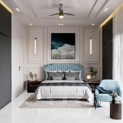 A master bedroom design that blends classic and contemporary styles. Elegant wall molding provides a sophisticated backdrop for a modern upholstered bed, complemented by sleek vertical wall lights and handleless wardrobes.