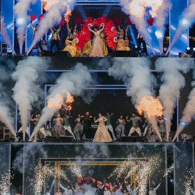 A Sangeet night is a full-blown production. I coordinate with choreographers and special effects teams to create high-impact stage performances, complete with fire, smoke, and professional dancers for a truly cinematic feel.