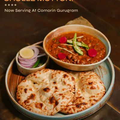 A dish close to our chef's heart, the Cholle Mutton. This unlikely duo combines tender mutton with hearty chickpeas in a rich, soulful gravy, served with soft naan for a truly comforting meal.