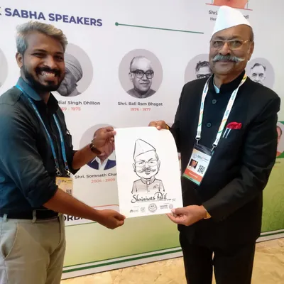 It was an honor to sketch Shri. Shrinivas Patil at the National Legislators Conference in Mumbai. Even in a formal setting, art can bring out smiles.