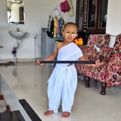 Here is our little Gandhi looking very determined. The costume includes the traditional dhoti, shawl, and round glasses to complete the iconic look for any school function or national day event.