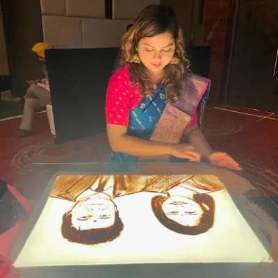 Performing live in my first Kanjivaram saree, creating a portrait for a special event. I love how traditional attire complements the cultural nature of my art.