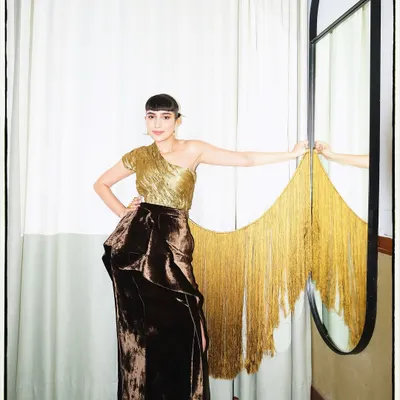 For a GQ Best Dressed feature, I wore this antique gold sculpted textile corset with a deconstructed silk velvet skirt, a look that plays with texture and form.