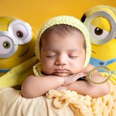 A close-up of our little Minion fan. The tiny tennis racket is a fun, quirky detail that adds so much personality to this themed shoot.